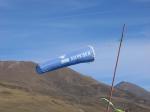 Paragliding Fluggebiet Europa » Schweiz » Graub�nden,Motta Naluns,geschichtstr�chtiger Windsack (Ailes de K[albermatten]: eine der Pionierfirmen)