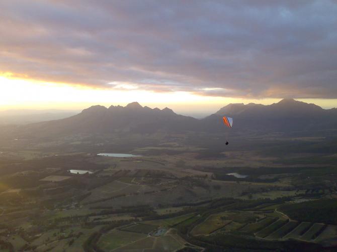 View to Stellenbosch Mountains and the winelands. Stephane is flying his Astral.