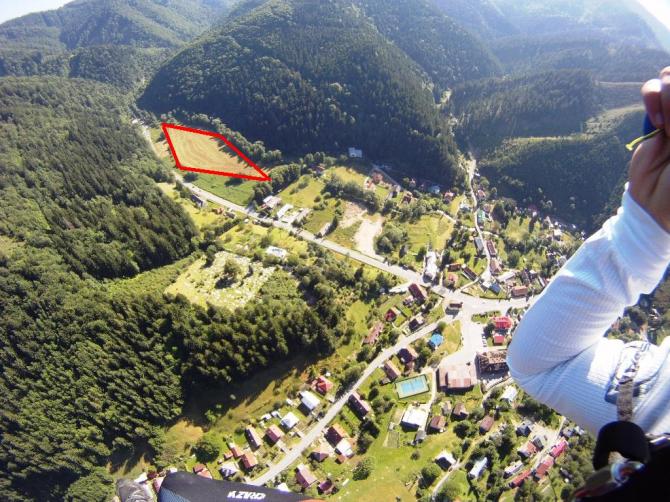 In Flight. Landing place Stare Hory 460m visible. Take care on  high voltage on both sides of the landing place!