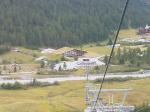 Paragliding Fluggebiet Europa » Italien » Trentino-Südtirol,Sulden, Stilfs,Offizieller Landeplatz rechts neben Sporthalle, links direkt hinter dem Fluss ist der Helilandeplatz zu sehen (Achtung Bäume!)